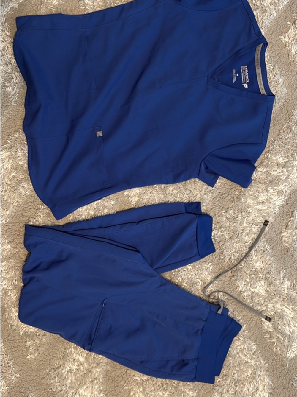 Two sets of Women’s Fabletics scrub sets OBO